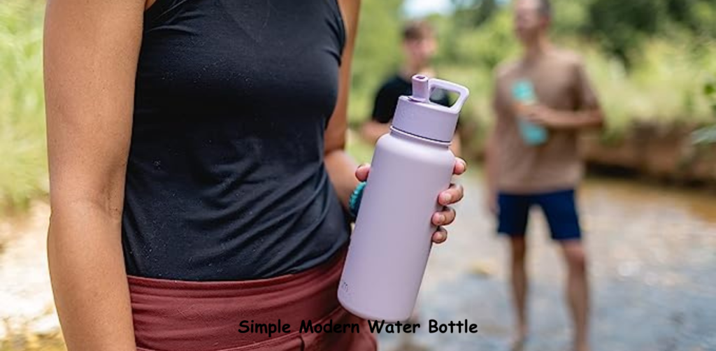 Simple Modern Insulated Water Bottle holding by a girl outdoor